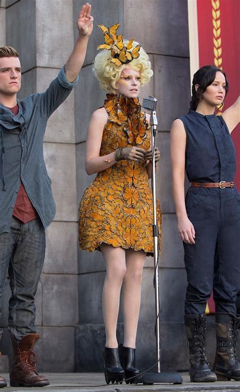 escort in the hunger games|Effie Trinket in The Hunger Games Character Analysis 